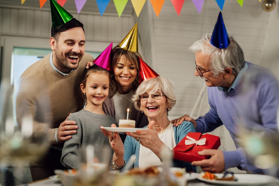 [fpdl.in]_cheerful-senior-woman-and-her-extended-family-having-fun-while-celebrating-her-birthday-in-dining-room_637285-3322_large.jpg