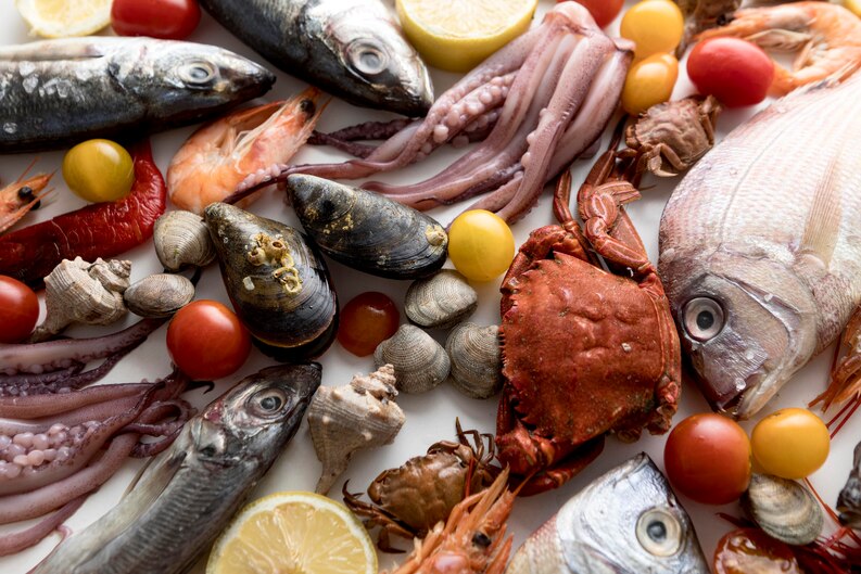 [fpdl.in]_top-view-of-assortment-of-seafood-with-tomatoes_23-2148643583_medium.jpg