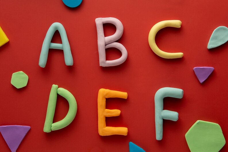 [fpdl.in]_playdough-art-with-letters-top-view_23-2149600827_medium.jpg